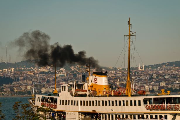 Ship producing black emissions